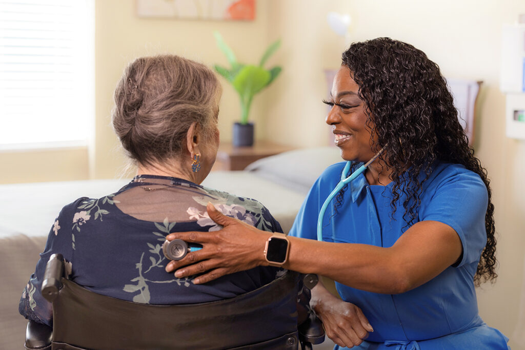 Nurse listening to patient's heartbeat at Waverly Hills Post Acute