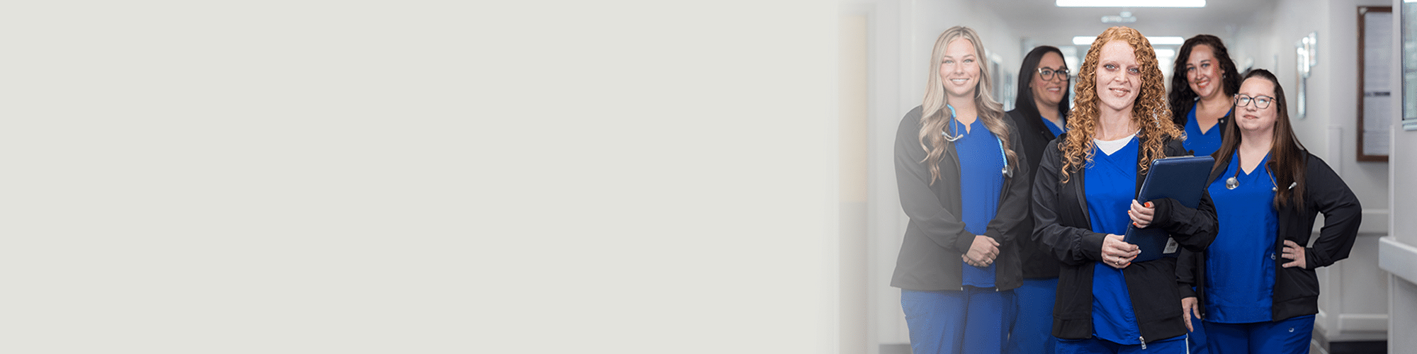 waverly nurses standing in the hallway smiling at camera